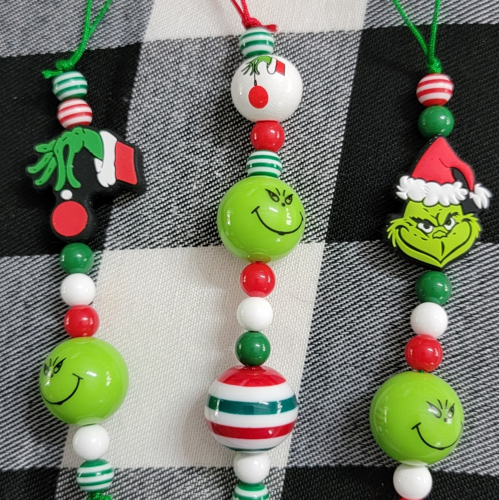 34. 3 Grinch Christmas ornaments
